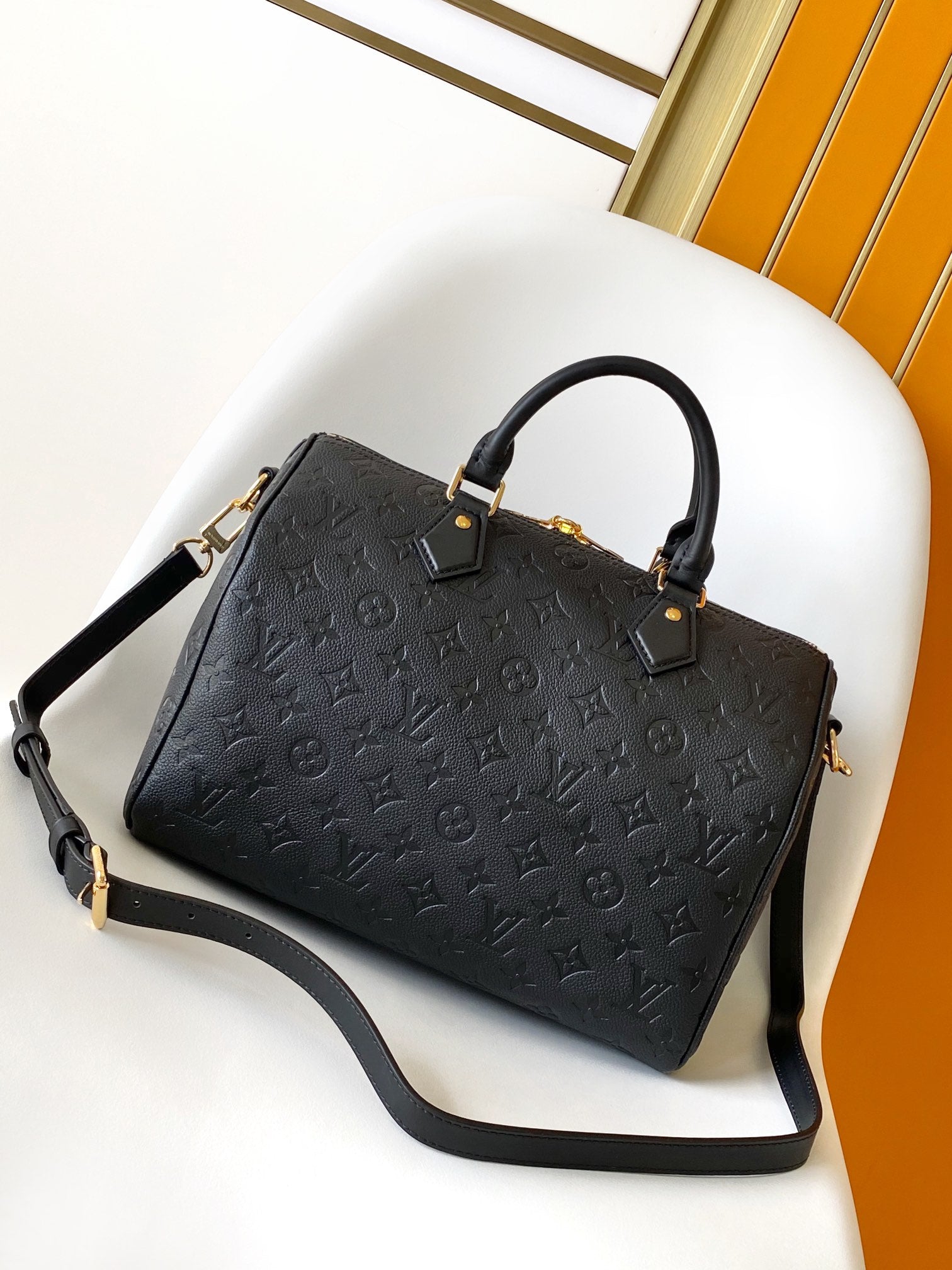 Louis Vuitton Black Embossed Leather Duffle Bag with Top Handles and Strap