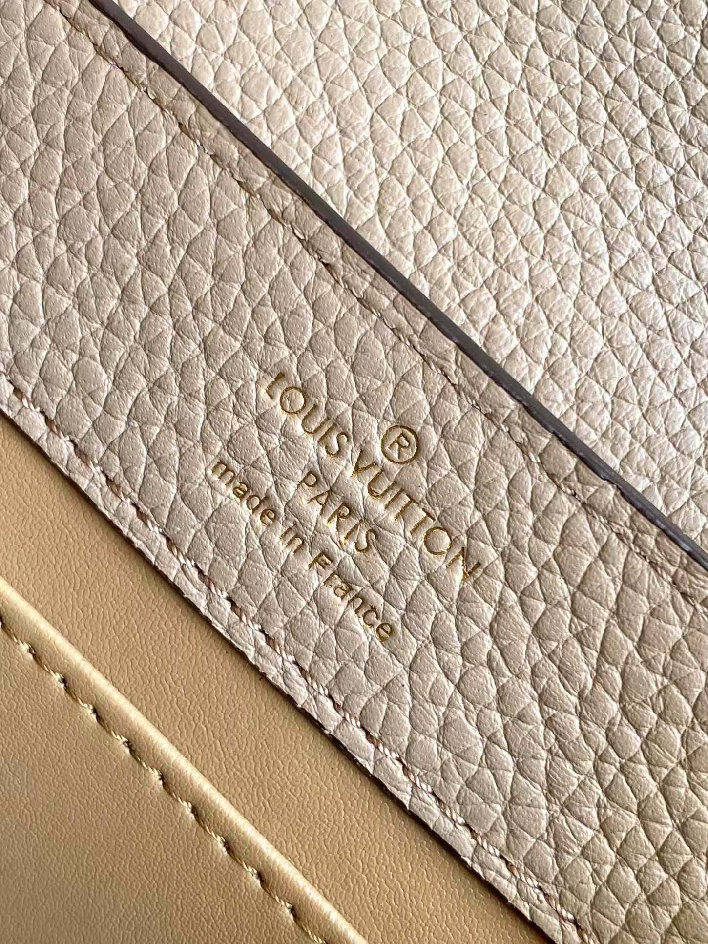 Louis Vuitton Luxury Beige Leather Top Handle Bag with Python Print Accents