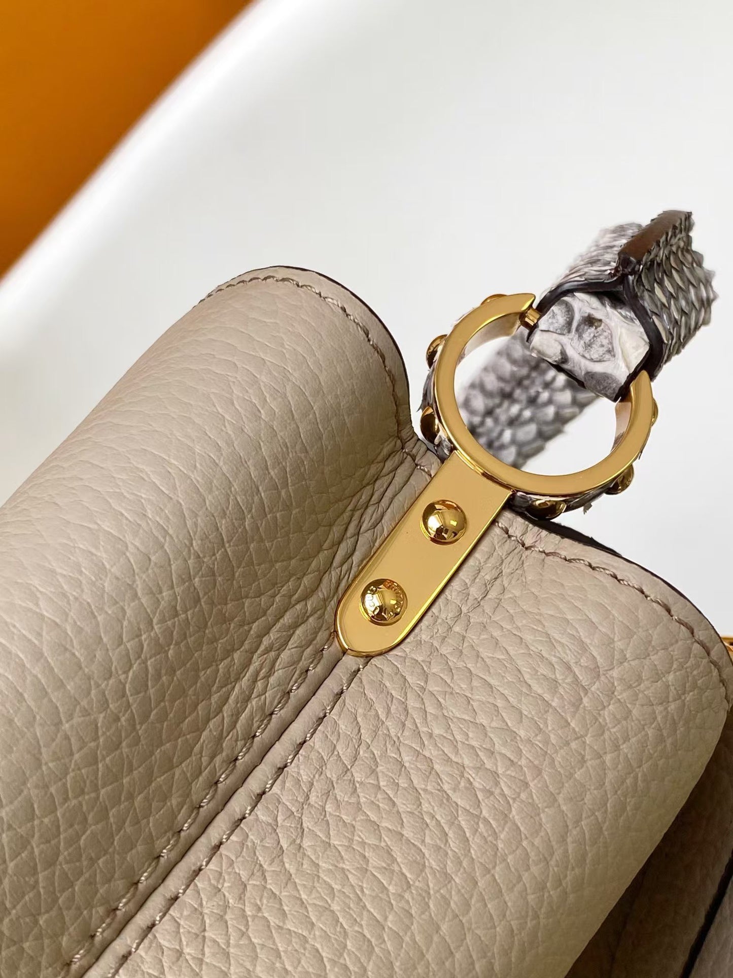 Louis Vuitton Luxury Beige Leather Top Handle Bag with Python Print Accents