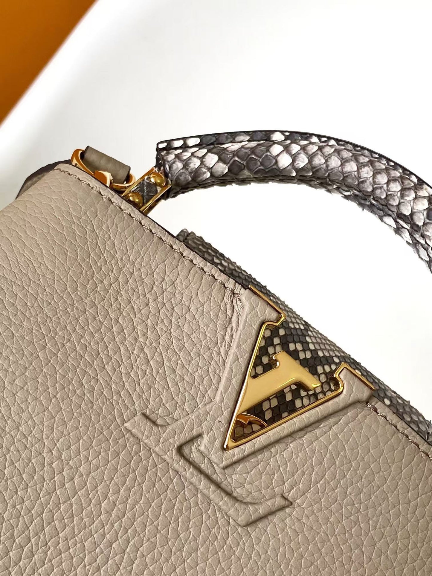 Louis Vuitton Luxury Beige Leather Top Handle Bag with Python Print Accents