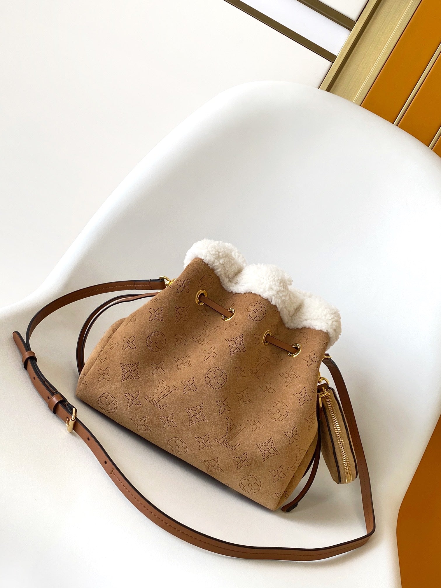 Louis Vuitton Camel Monogram Embossed Bucket Bag with Shearling Trim and Pouch