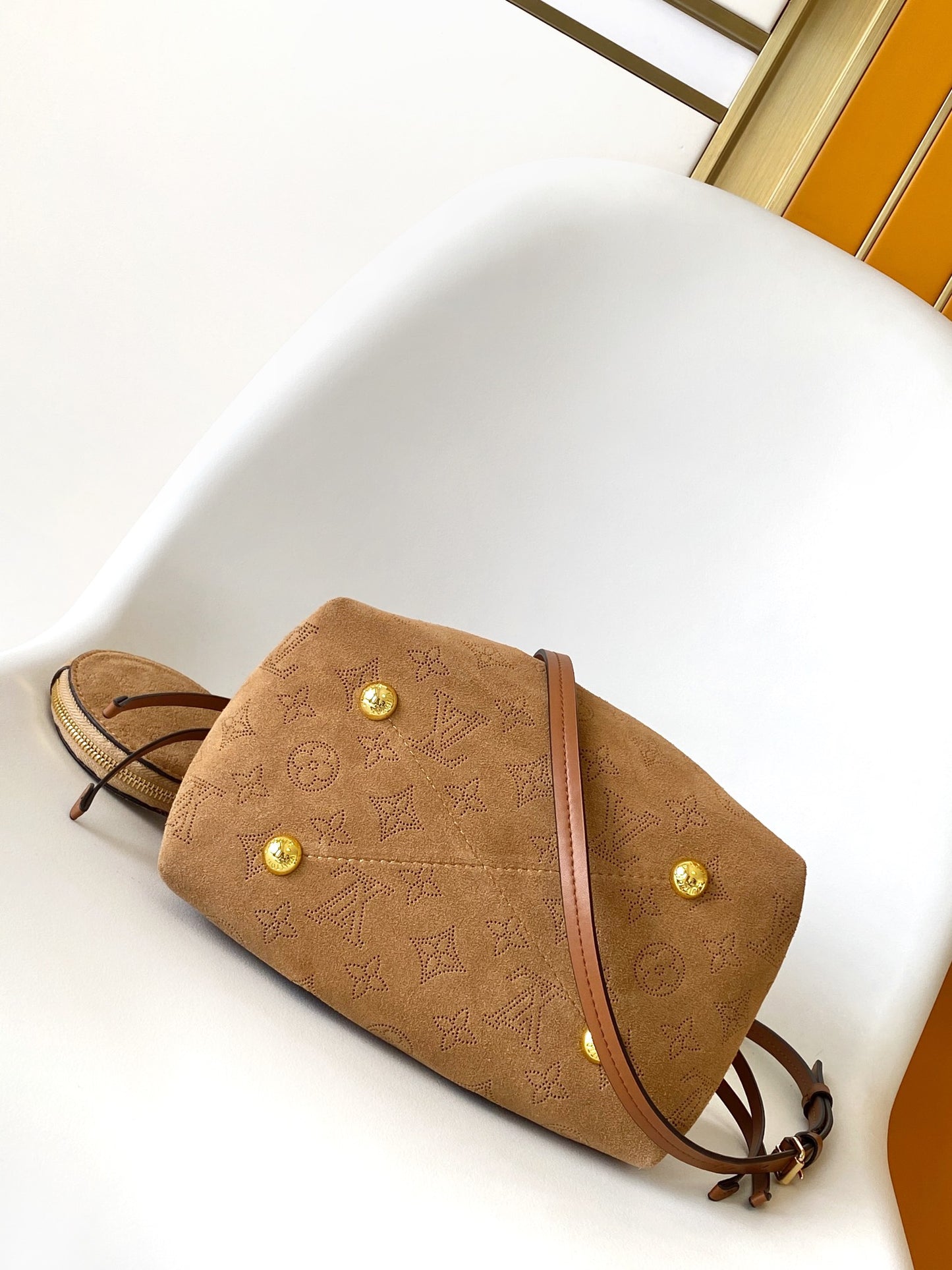 Louis Vuitton Camel Monogram Embossed Bucket Bag with Shearling Trim and Pouch