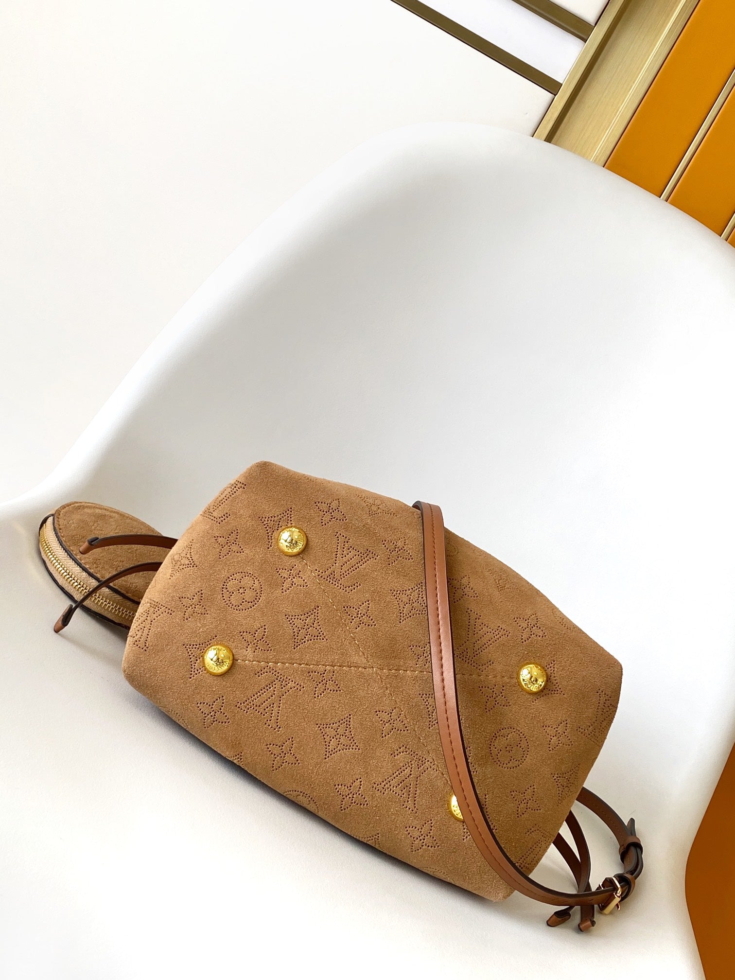 Louis Vuitton Camel Monogram Embossed Bucket Bag with Shearling Trim and Pouch