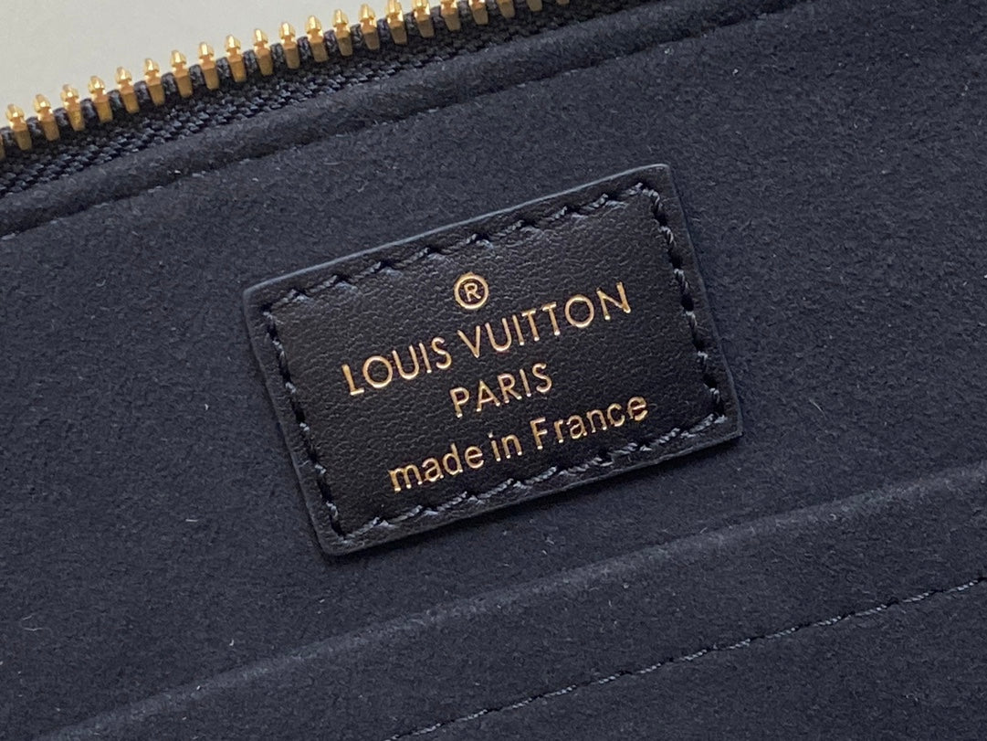 Louis Vuitton Elegant Black Embossed Leather Dome Satchel with Gold Chain