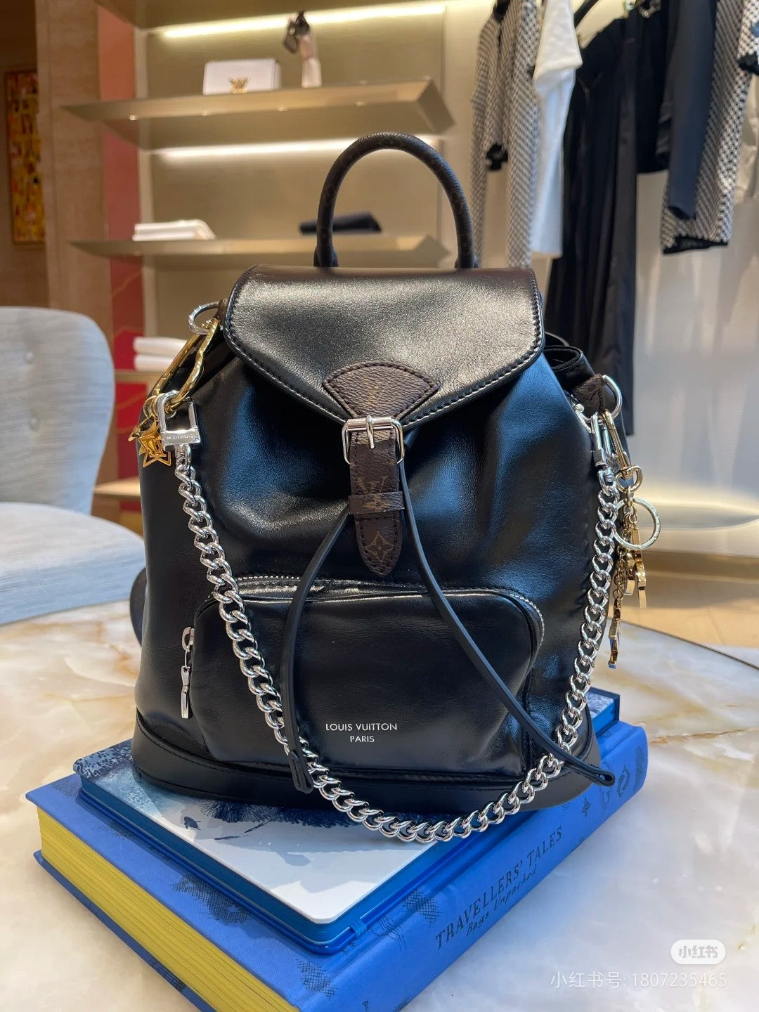 Louis Vuitton Black Leather Drawstring Backpack with Silver Chain Accent