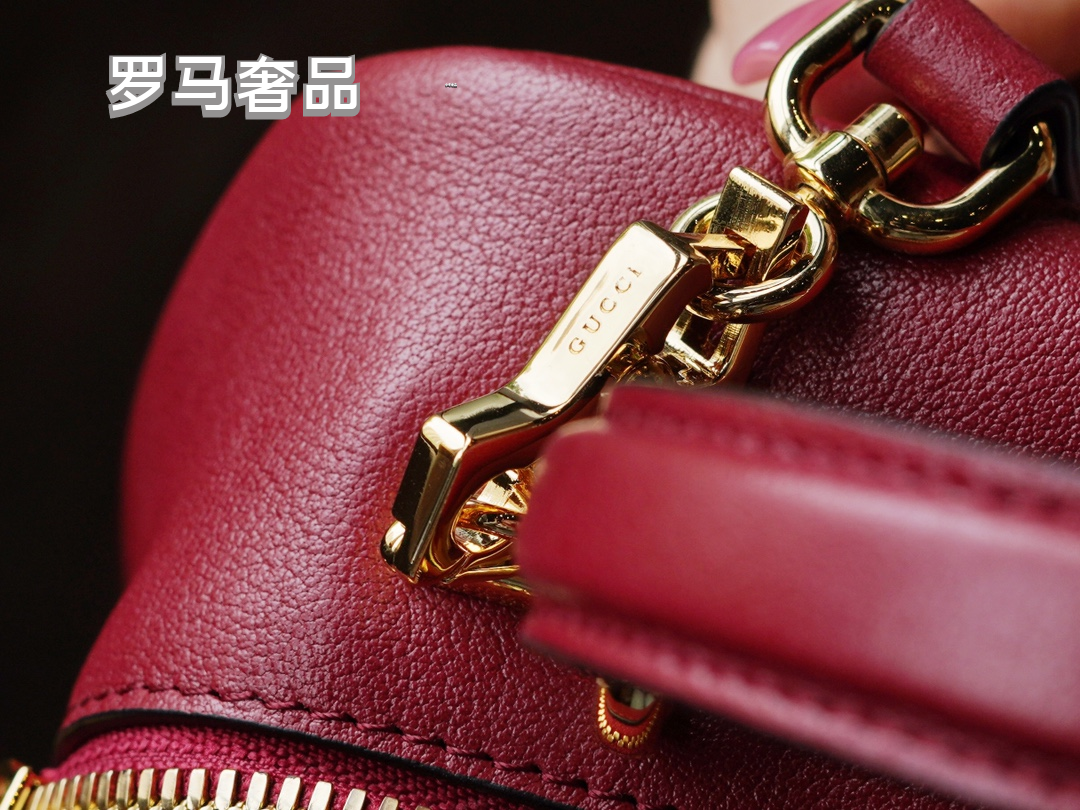 Gucci Red Leather Crossbody Camera Bag with Embossed Logo and Tassel