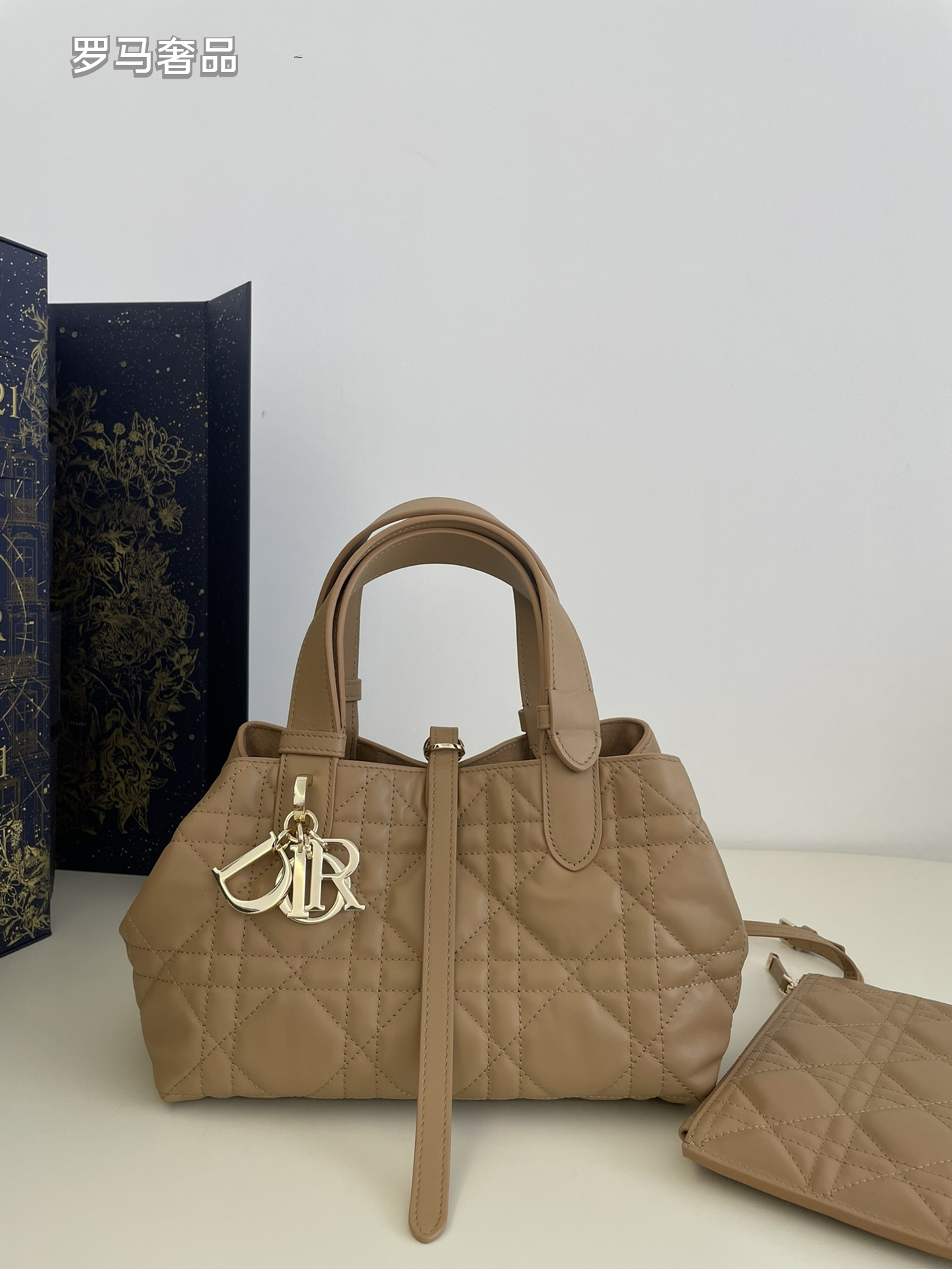 Dior Elegant Black Quilted Top Handle Handbag with Gold Letter Charms