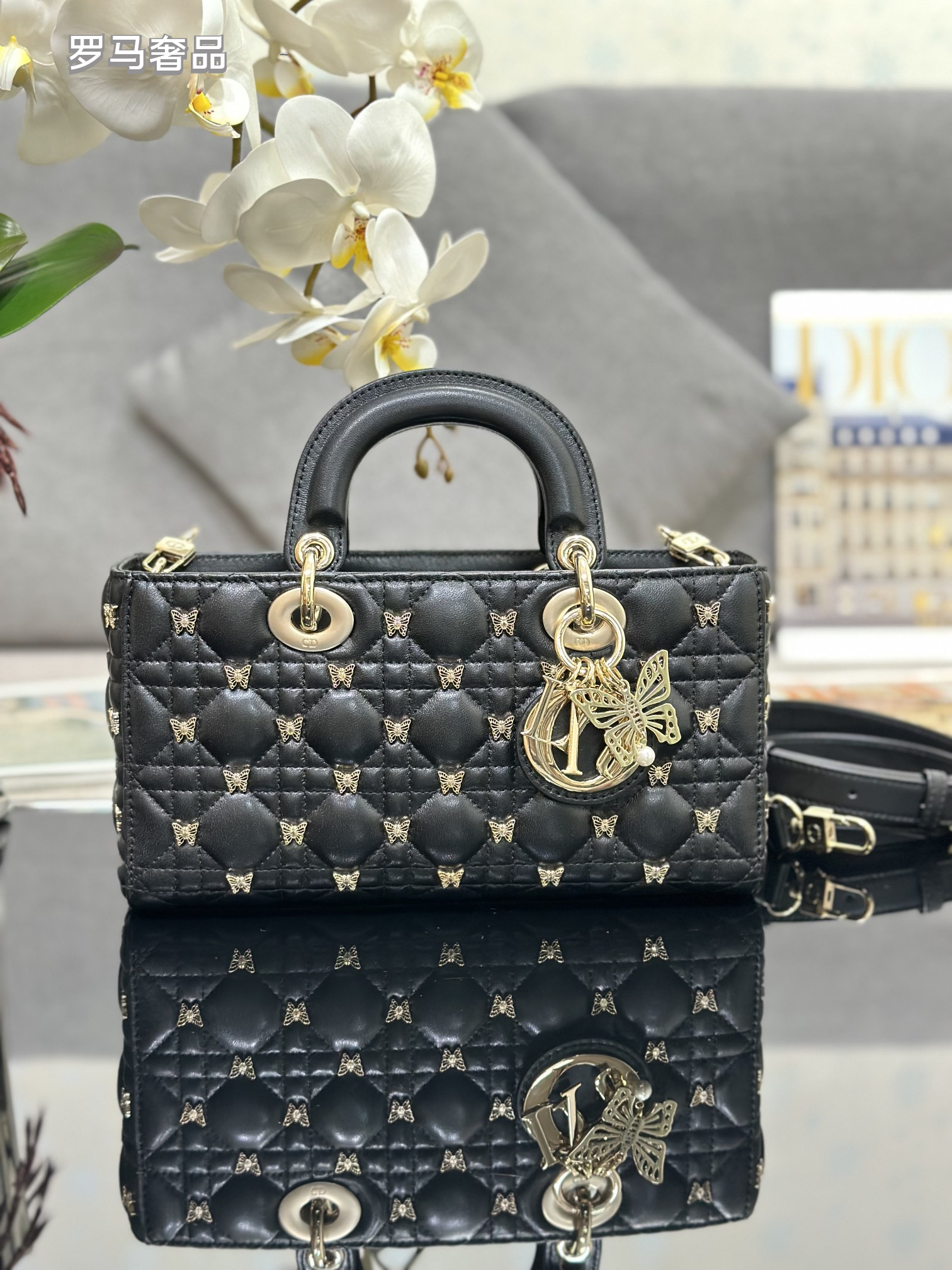 Dior Luxury Black Quilted Leather Top Handle Bag with Gold Butterfly Charm