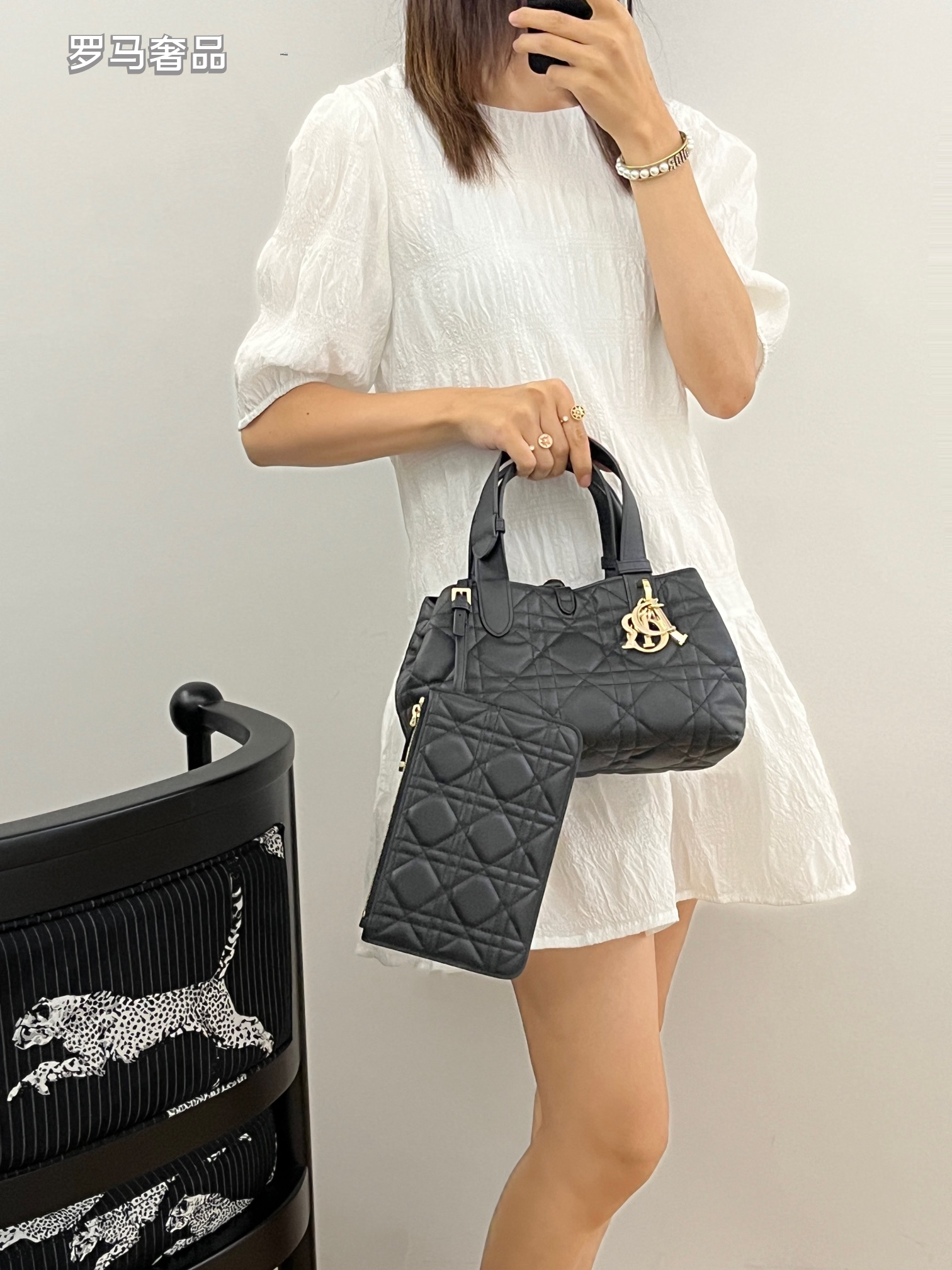 Dior Elegant Black Quilted Top Handle Handbag with Gold Letter Charms