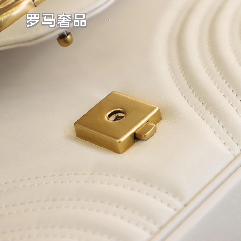 Gucci Elegant White Chevron Quilted Leather Handbag with Gold Hardware