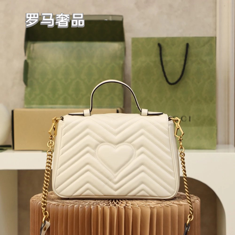 Gucci Elegant White Chevron Quilted Leather Handbag with Gold Hardware